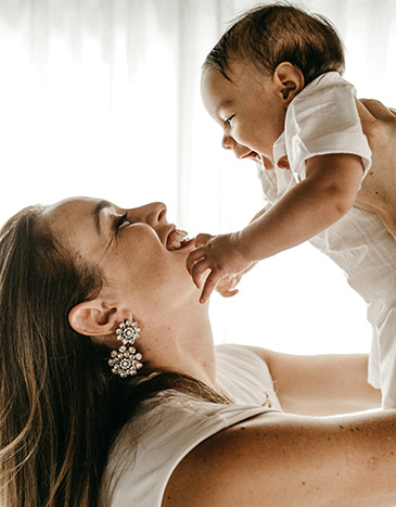 Mother with baby. Taking steps towards increasing fertility. 