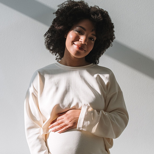 Pregnant Afro-American woman. 